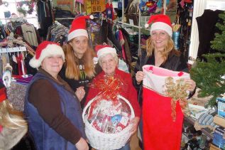 Staff at The Treasure Trunk Janet Barr, Casie Fanning, Shirley Dewey and Sarah Gould show off the goodies they have assembled for this holiday season